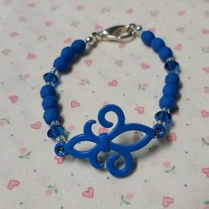 Neon Blue Fleur De Lis Bracelet.